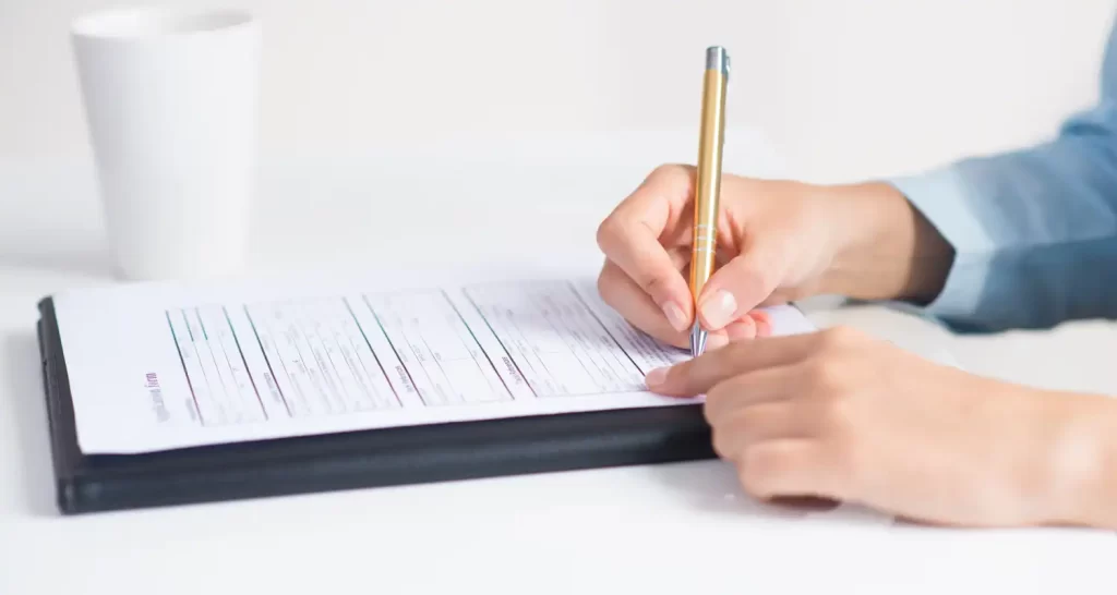 Closeup of candidate signing application form