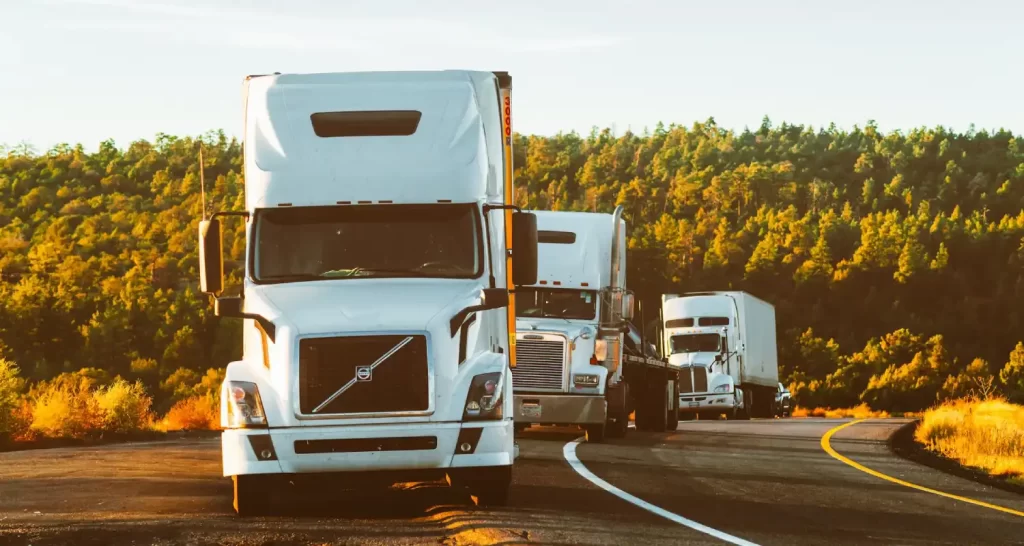 White Volvo Semi-truck on Side of Road