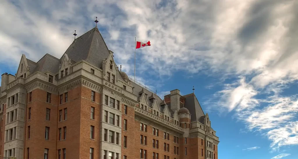 Brown White and Gray Building with canadian flag