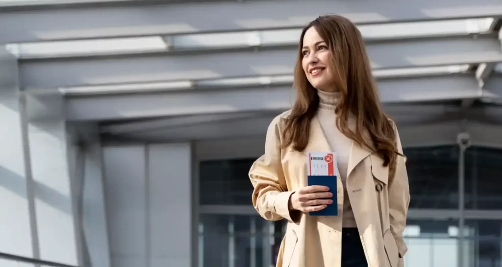 simling lady at the airport