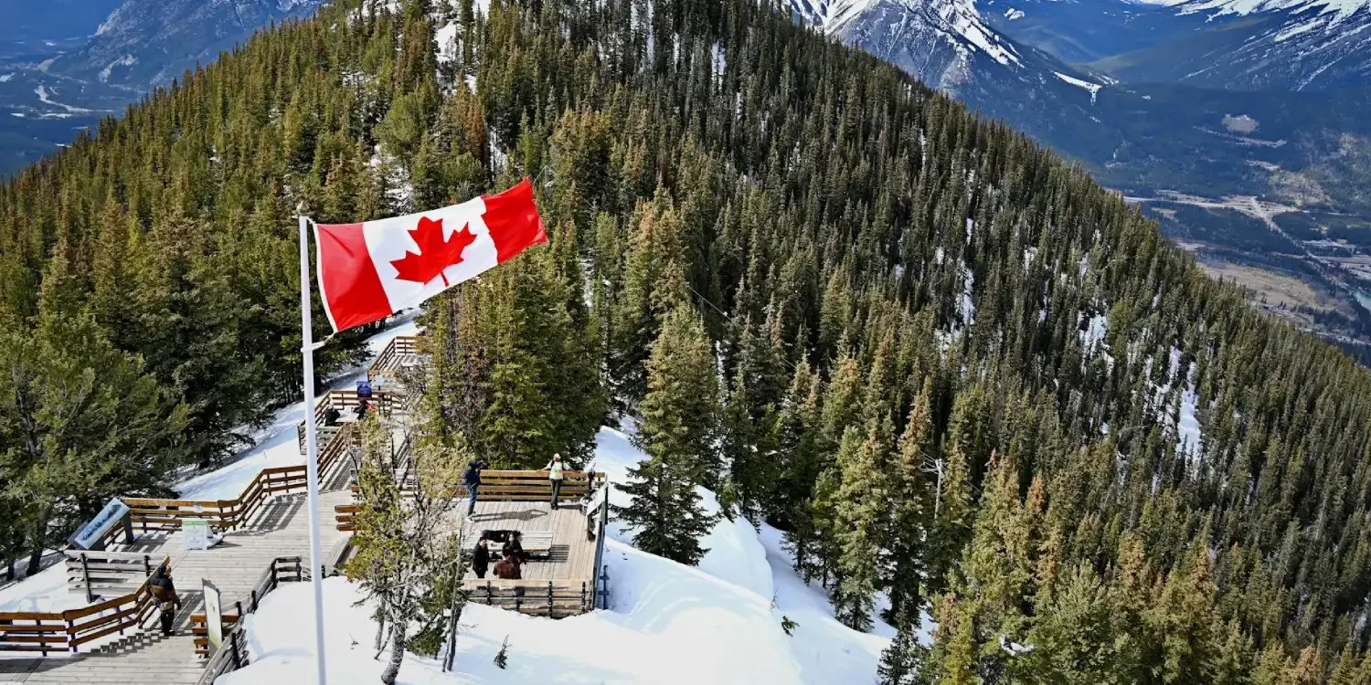 Flag of Canada on Hilltop at Banff National Park