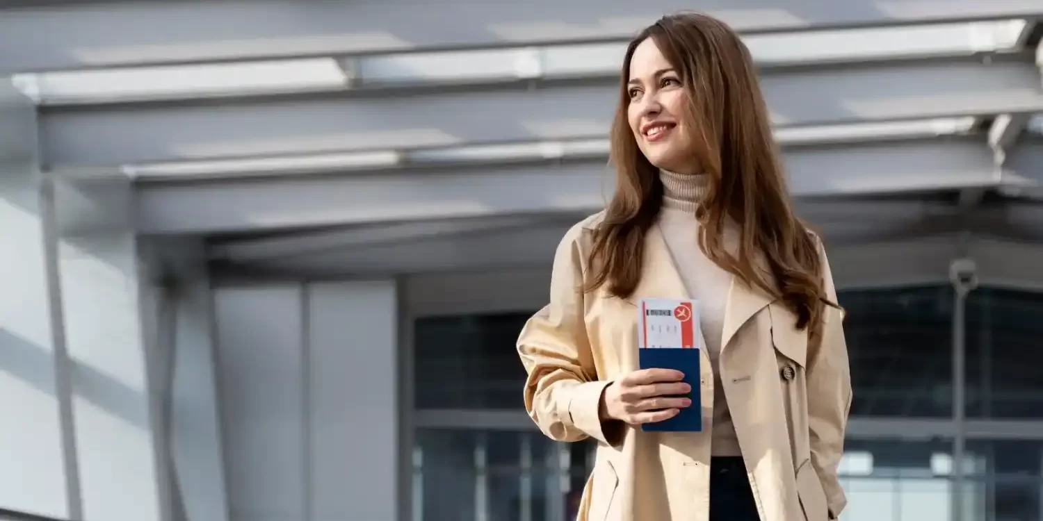 simling lady at the airport